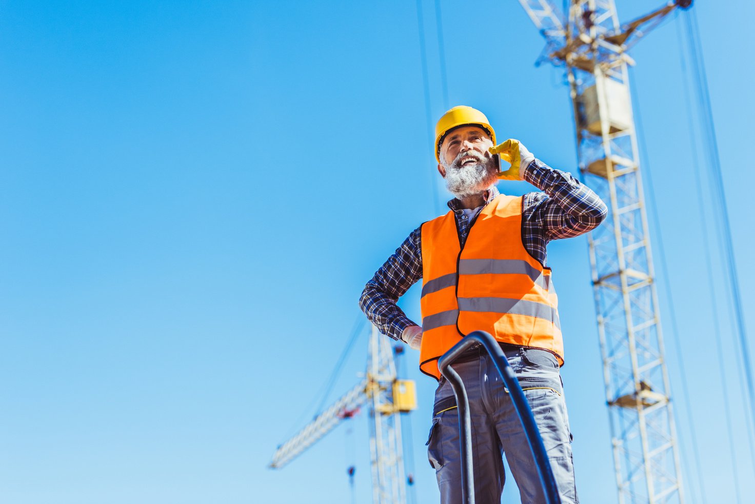 construction worker talking on phone